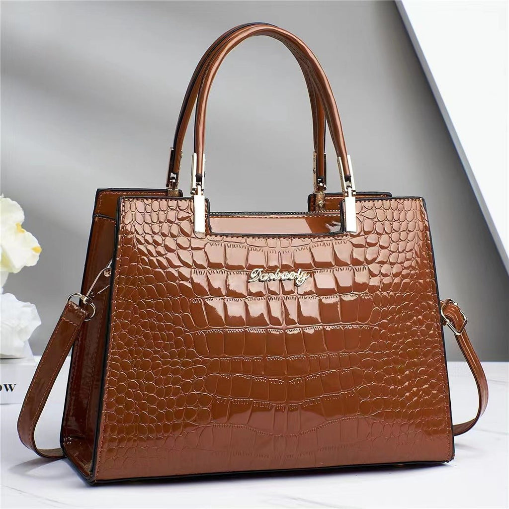 SUENTA Sophé | Glänzende Krokodil Handtasche Braun