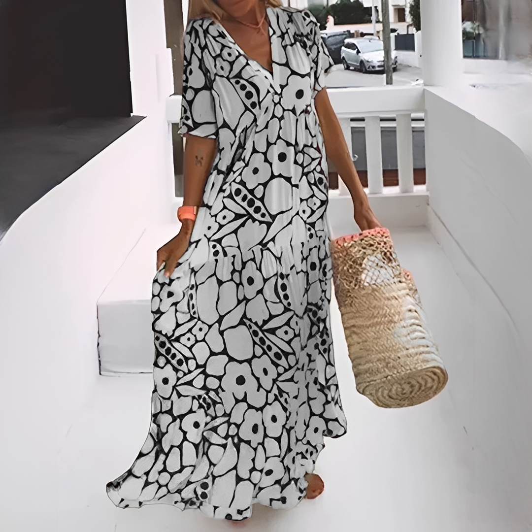 SUENTA Vanity | Damen Sommerkleid – Figurschmeichelnder V-Ausschnitt, Modernes Druckmuster & Schickes Design Schwarz