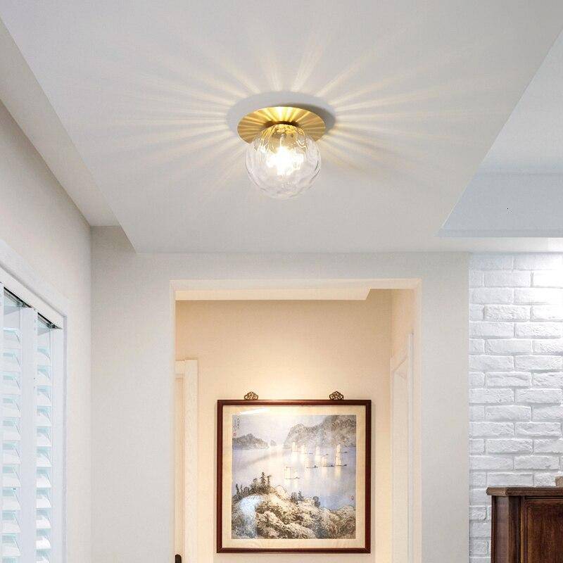 SUENTA Runder goldfarbener LED-Deckenleuchte mit Glaskugel Porch