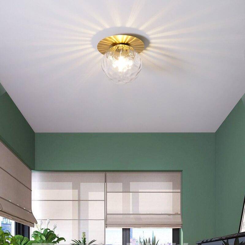 SUENTA Runder goldfarbener LED-Deckenleuchte mit Glaskugel Porch